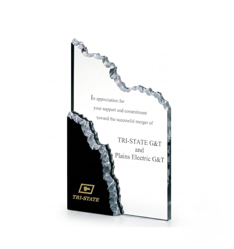 Crystal award plaque with a jagged edge, inscribed with thanks to Tri-State G&T and Plains Electric G&T.